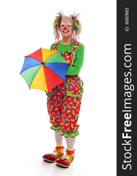 Clown with umbrella smiling and standing up