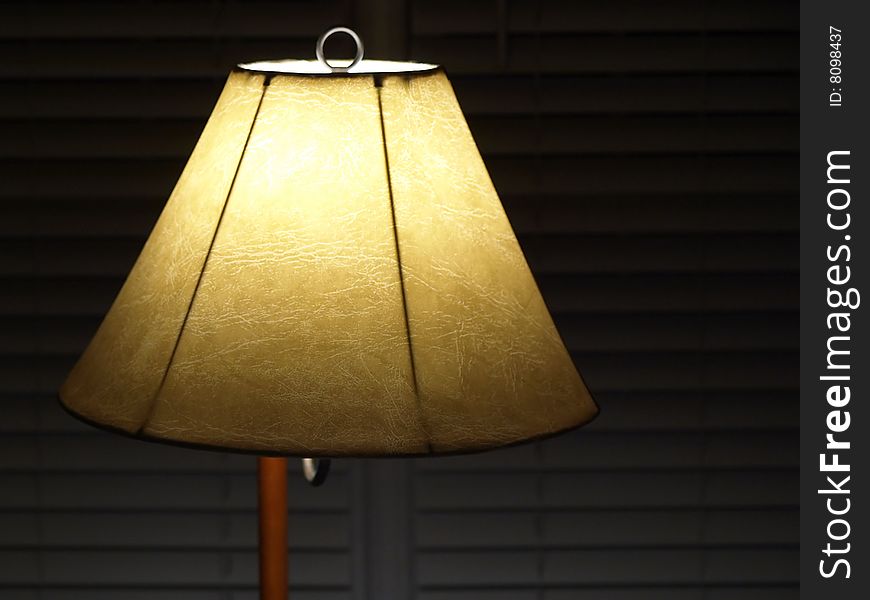 Glowing Lamp with shade and background Blinds. Glowing Lamp with shade and background Blinds