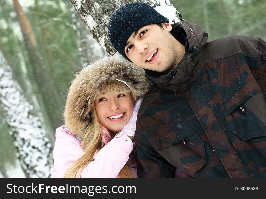 Young couple in winter park