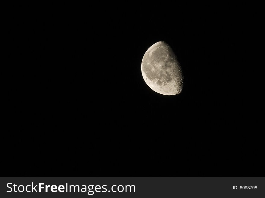 Half moon on black sky