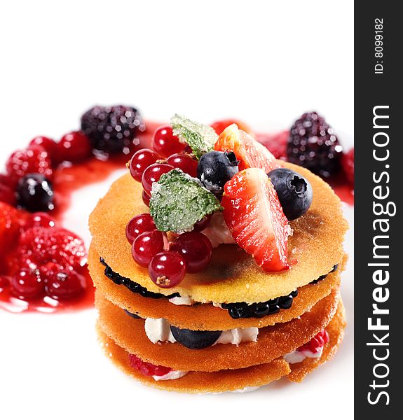 Dessert with Fresh Berries and Mint. Isolated over White. Dessert with Fresh Berries and Mint. Isolated over White