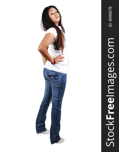 Young Asian woman in tight jeans and white blouse and long dark hair
standing in the studio for white background. Young Asian woman in tight jeans and white blouse and long dark hair
standing in the studio for white background..