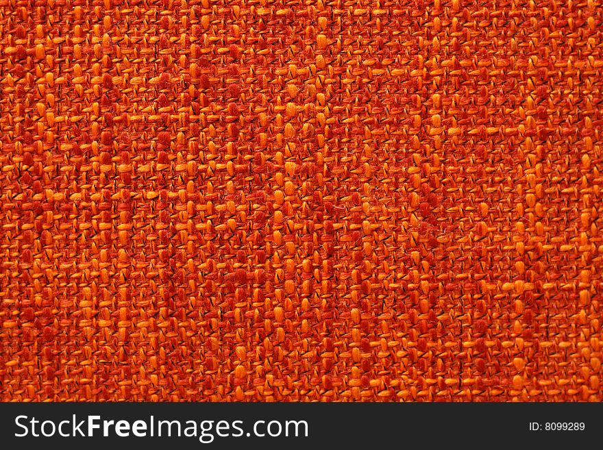 Close up orange fabric backround. Close up orange fabric backround