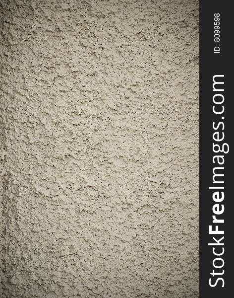 Close-up of stucco wall showing strong texture. Close-up of stucco wall showing strong texture