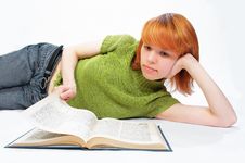 Young Girl Read The Book On White Royalty Free Stock Image