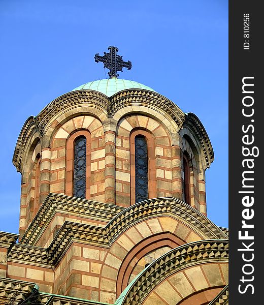 Church dome with cross on the top from outside. Church dome with cross on the top from outside