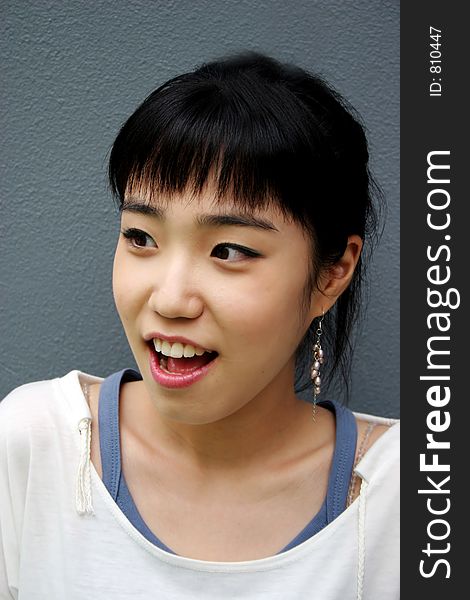 Korean girl looking surprised