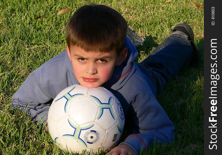 A boy who takes his soccer seriously. A boy who takes his soccer seriously