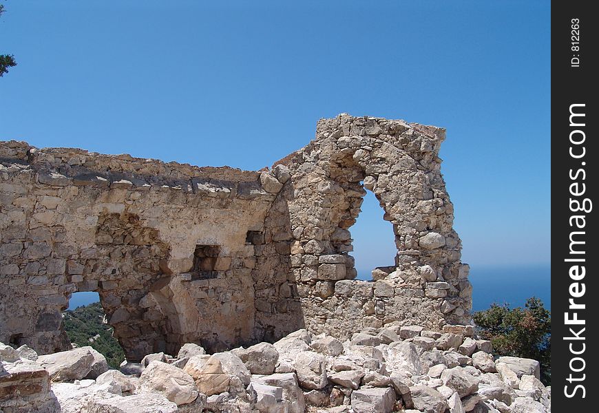 Old rock castle on a mountain on Rhodes in Greece. Old rock castle on a mountain on Rhodes in Greece