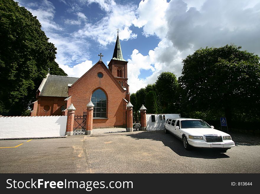 Church  with  a limo in denmark a sunny summer day