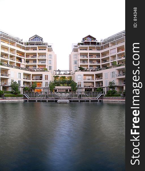 Portrait photo of luxury residential units from canal. Portrait photo of luxury residential units from canal.