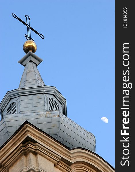 Cross and early evening moon. Cross and early evening moon