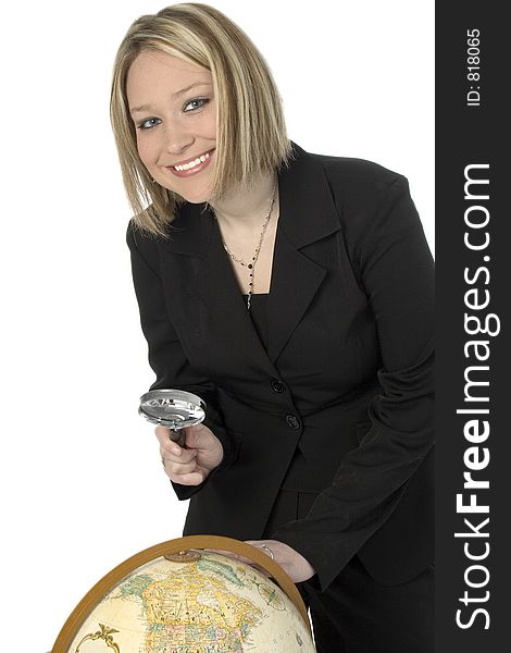Beautiful blonde in business suit with magnifying glass and globe. Beautiful blonde in business suit with magnifying glass and globe.
