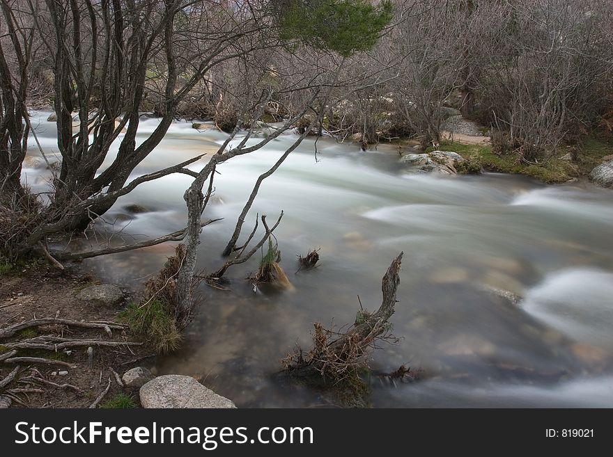 Artistic long exposure of a water in a river. Artistic long exposure of a water in a river