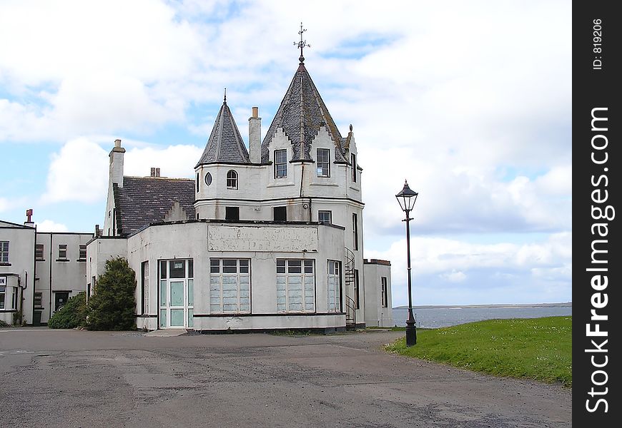 A boarded up and scary looking place in John O'Groats, Scotland.
