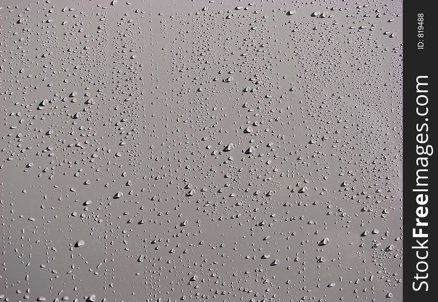 Drops of water on a car door. Drops of water on a car door