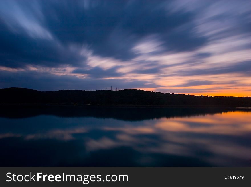 Clouds moving in a scenic lake  landscape. Clouds moving in a scenic lake  landscape