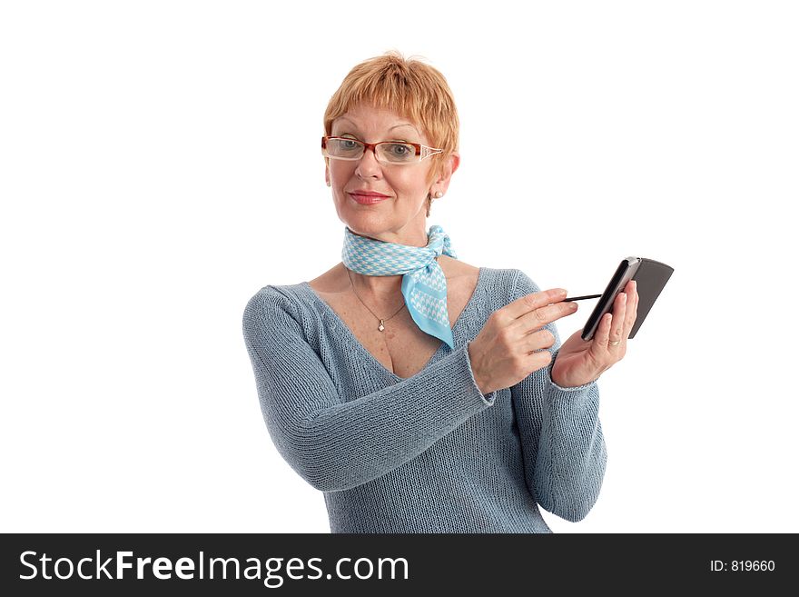 Attractive mature woman using handheld