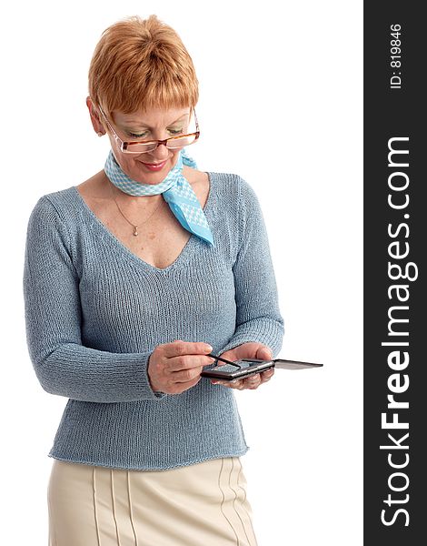 Attractive mature woman using handheld