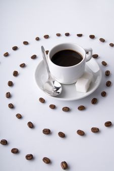 Coffee Cup And Spiral Of Grains Stock Images