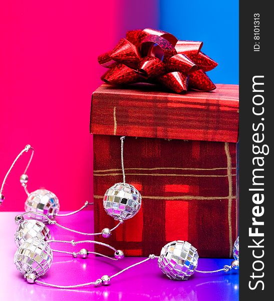 Red gift box with decoration balls