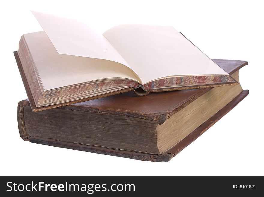 A pile of old leather bound books isolated on a white background