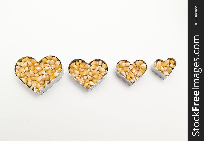 Heart of corn 	
isolated on a white background