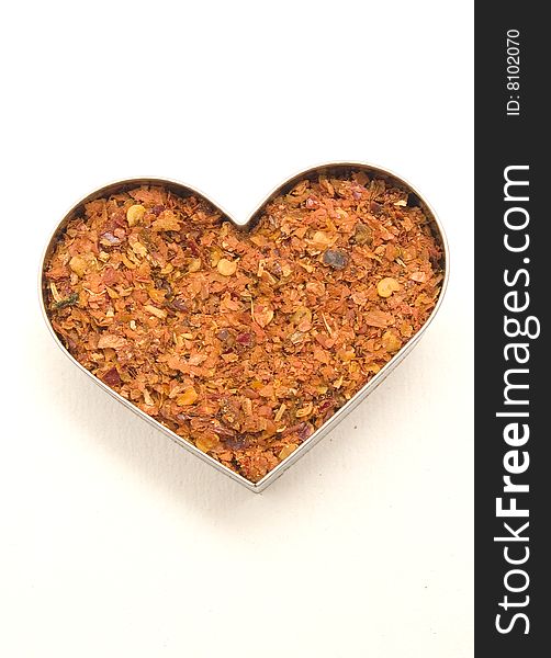 Crushed red pepper 	
isolated on a white background