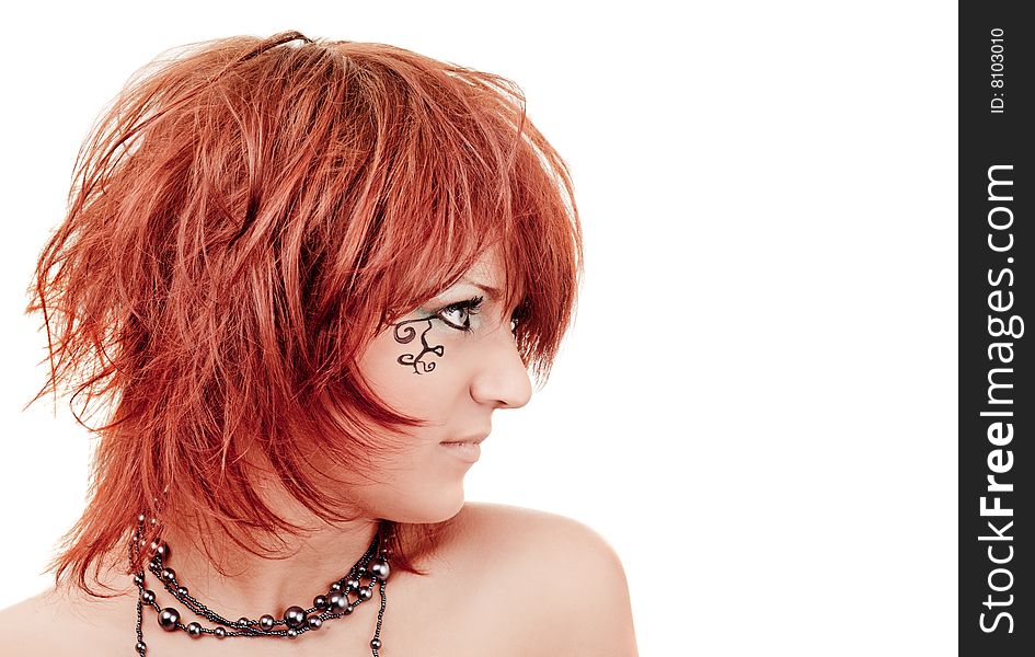 Young girl face profile with a tattoo on white background