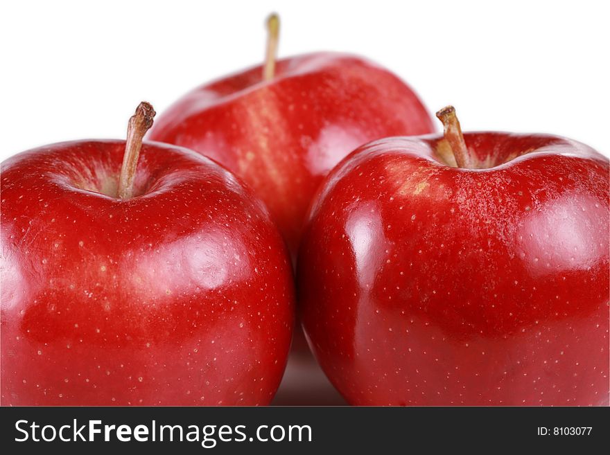 Three shiny red gala apples. Three shiny red gala apples