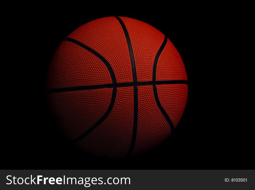 Classic basketball isolated on color