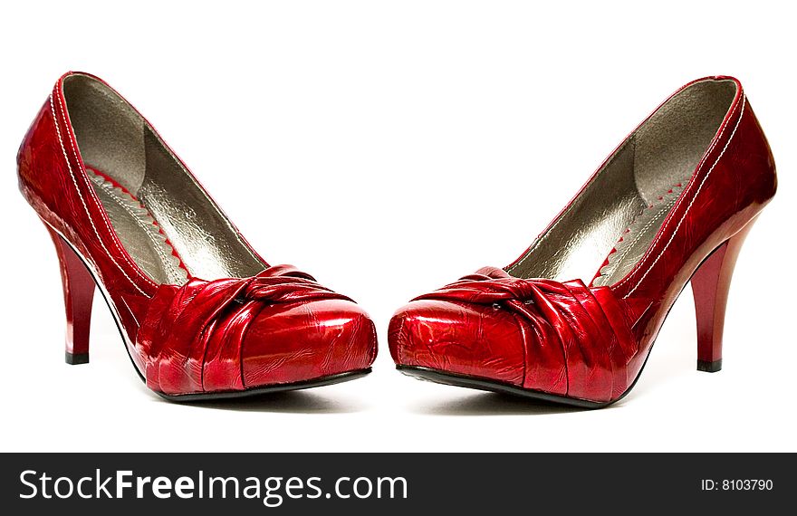 Red womanish shoes isolated on white background