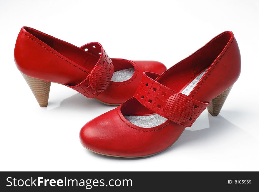 Red woman shoes isolated on white. Red woman shoes isolated on white