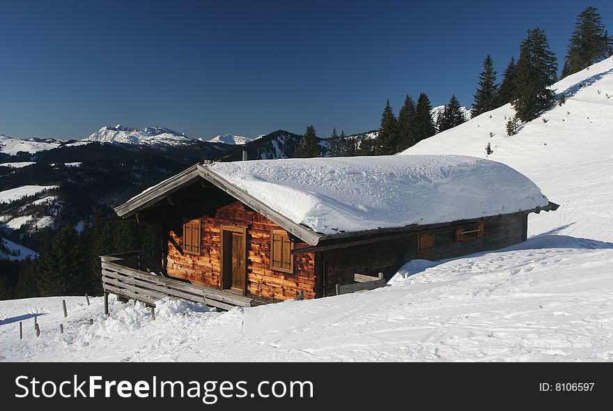 Wooden chalet in winter mountain. Wooden chalet in winter mountain