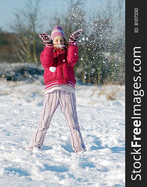 Winter play - girl in the park