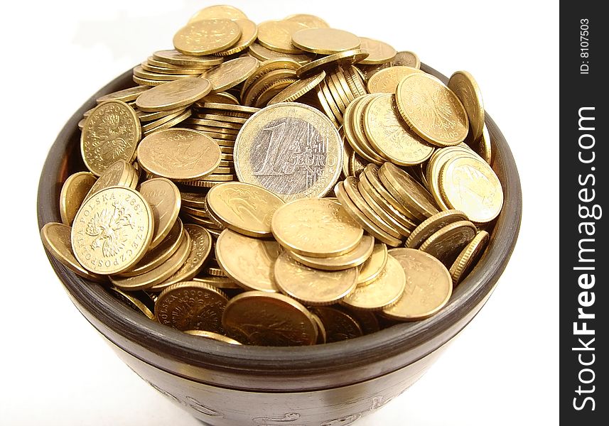 Bowl full of polish and euro coins. Bowl full of polish and euro coins