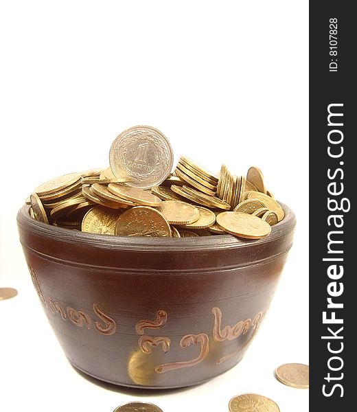 Coins In Ancient Bowl