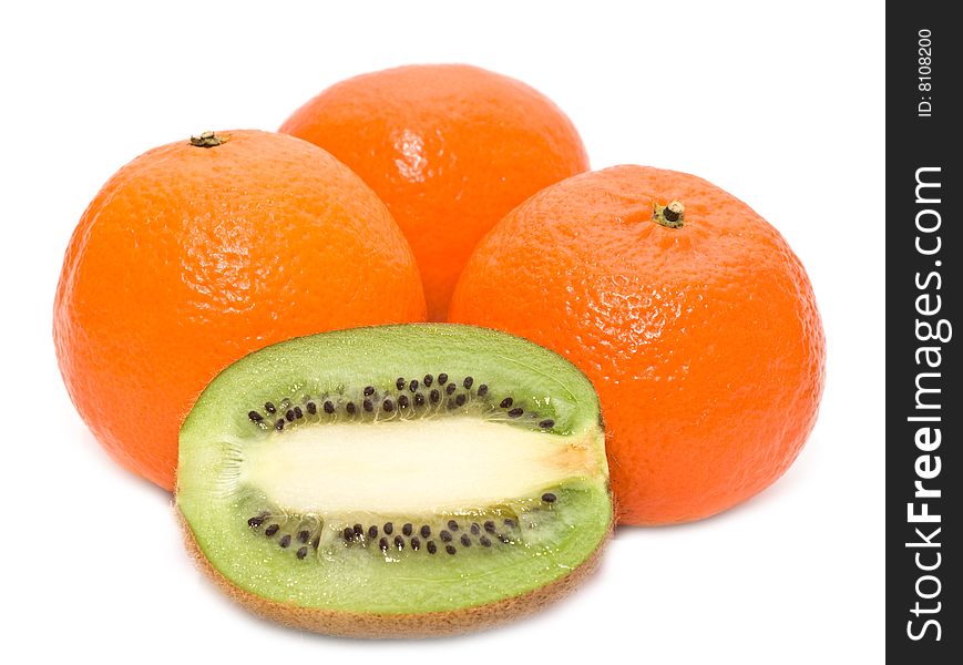 Kiwi and mandarines on a white background