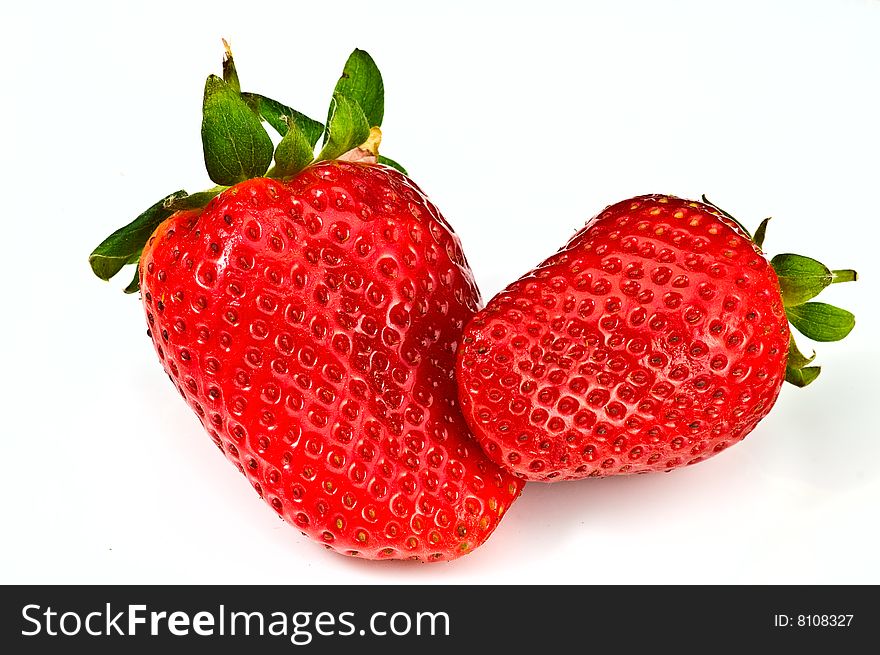 Two fresh ripe strawberries on white background. Two fresh ripe strawberries on white background