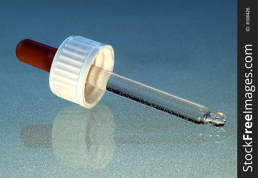 Closeup of the eyedropper, usable for research and medical theme.