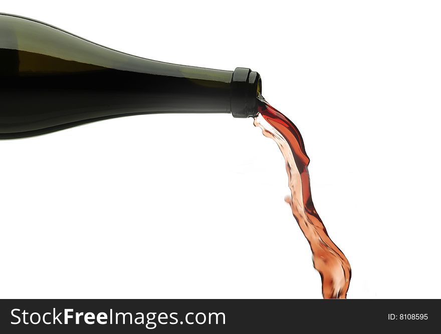 Red wine pouring down from a wine bottle