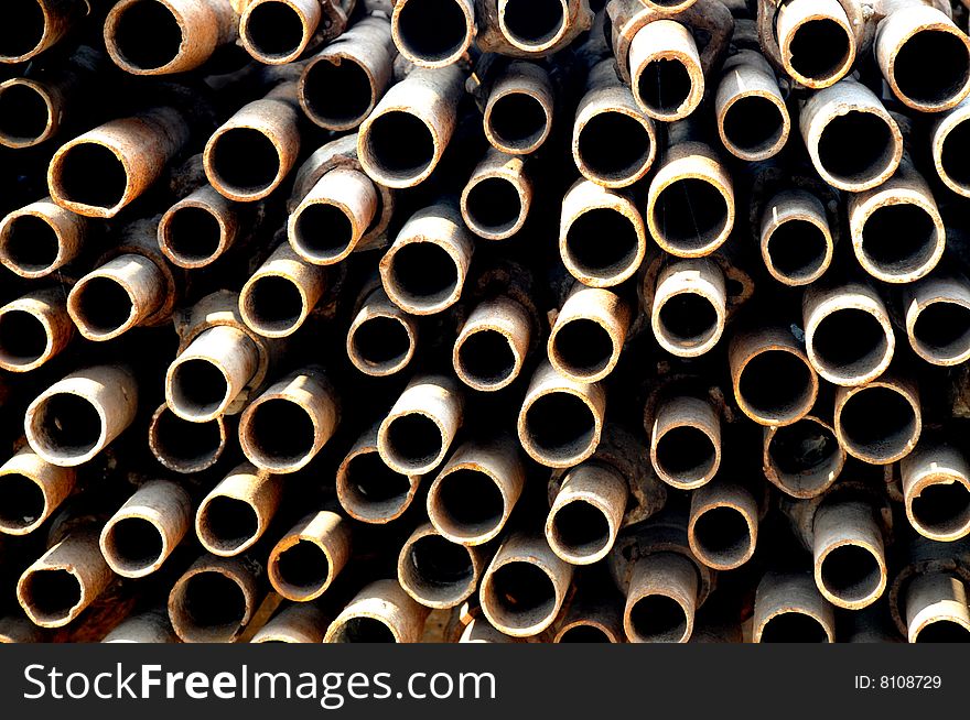 The round rusty iron tubes. The round rusty iron tubes.