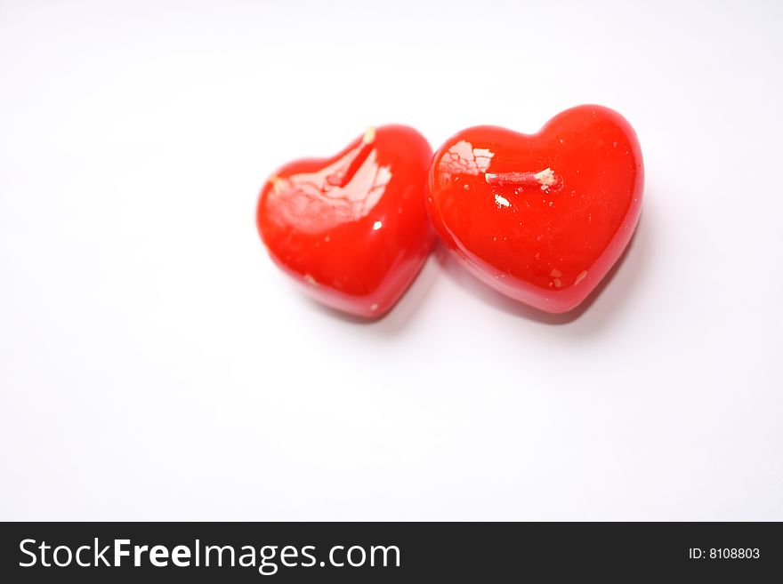 Heart-shape valentine candles to show love. Heart-shape valentine candles to show love
