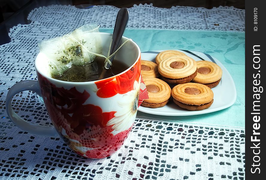 Cup of tea and some cookies on the table. Cup of tea and some cookies on the table...