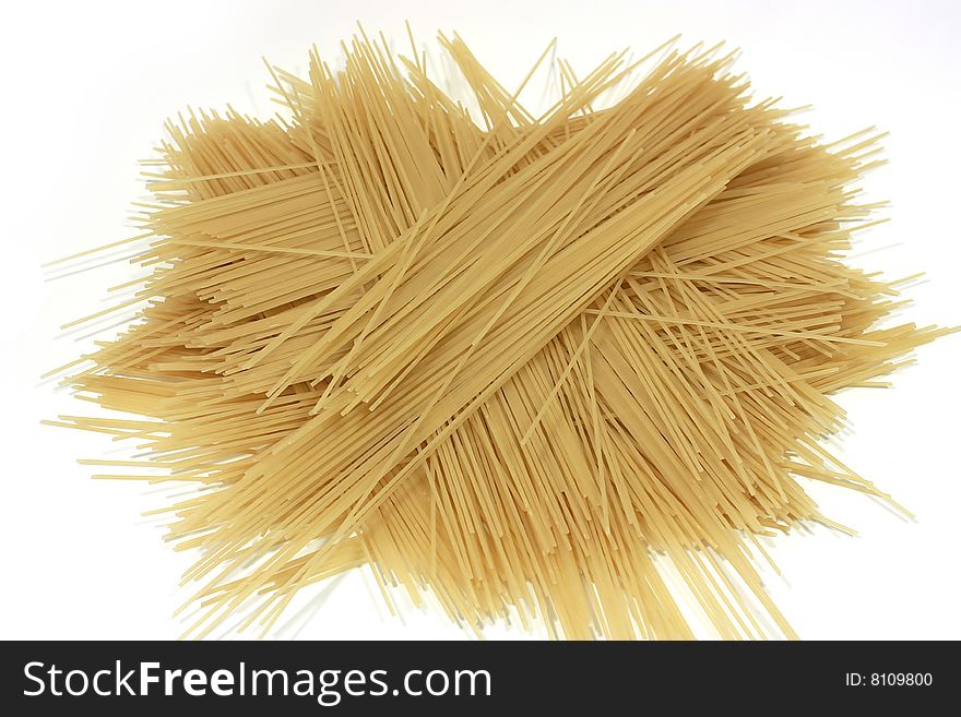 Spagetti on a white background
Raw spagetti on a white background