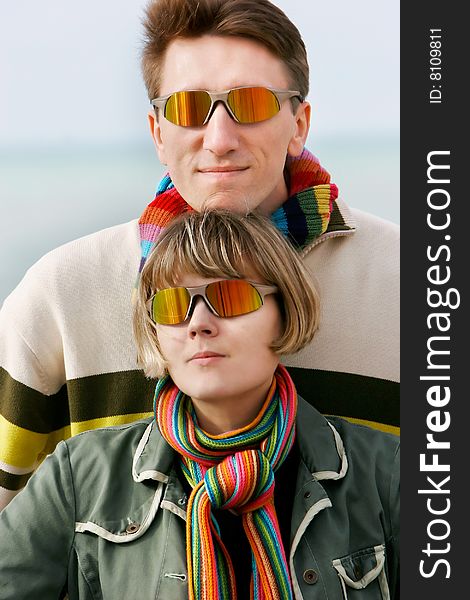 Portrait of young couple in sunglasses