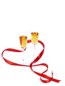 Two Wine Glasses And Red Satiny Tape Stock Photo Two Wine Glasses And Red Satiny Tape Stock Photo
