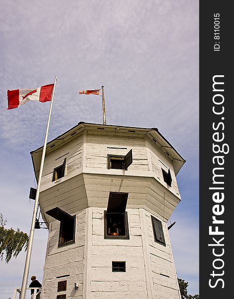 An old wooden fortress with cannon ports on the coast of British Columbia, Canada. An old wooden fortress with cannon ports on the coast of British Columbia, Canada