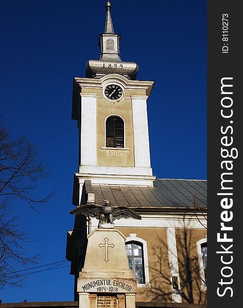 An orthodox church and a monumet. An orthodox church and a monumet