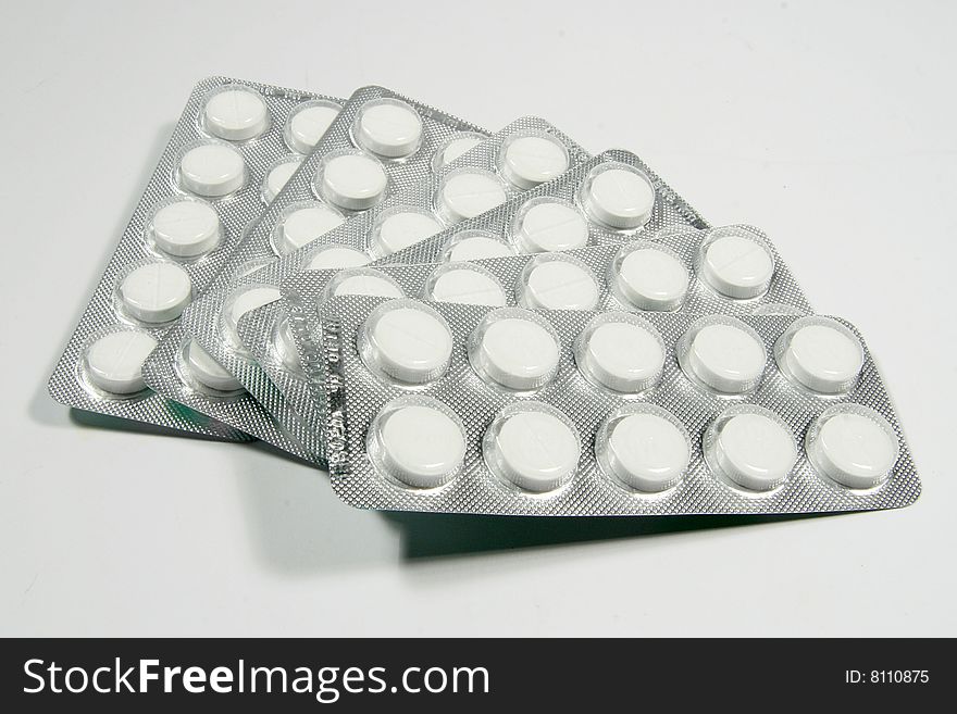 Some blocks of white pills